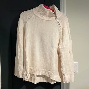 Lisa Todd cream sweater with zipper collar and red heart on back